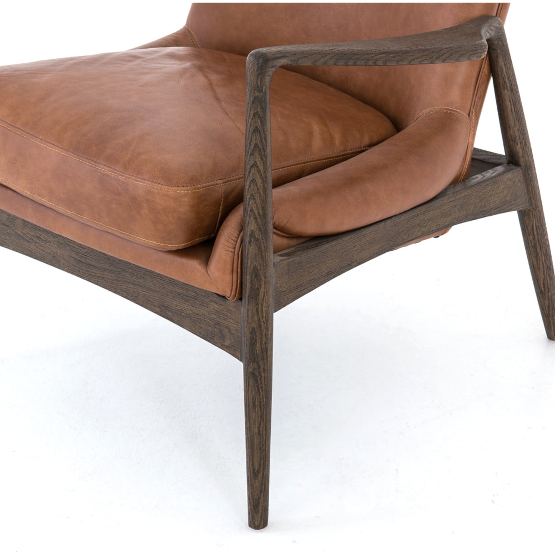 Braden Chair by Four Hands. Made from top grain leather, solid oak, 100% polyester in a modern style.