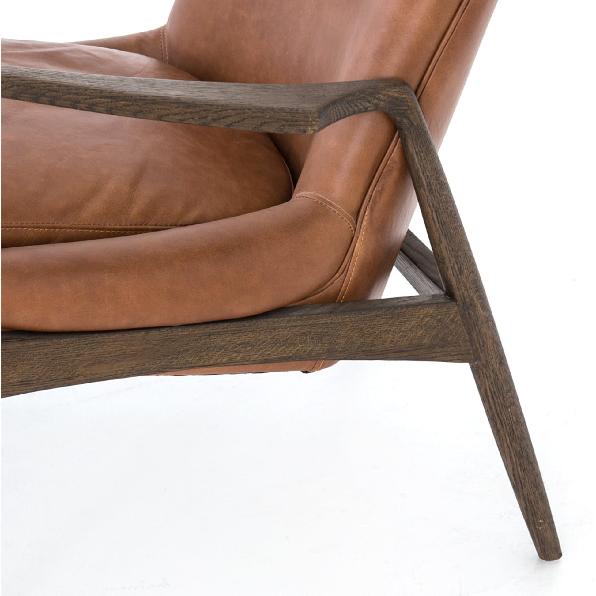 Braden Chair by Four Hands. Made from top grain leather, solid oak, 100% polyester in a modern style.
