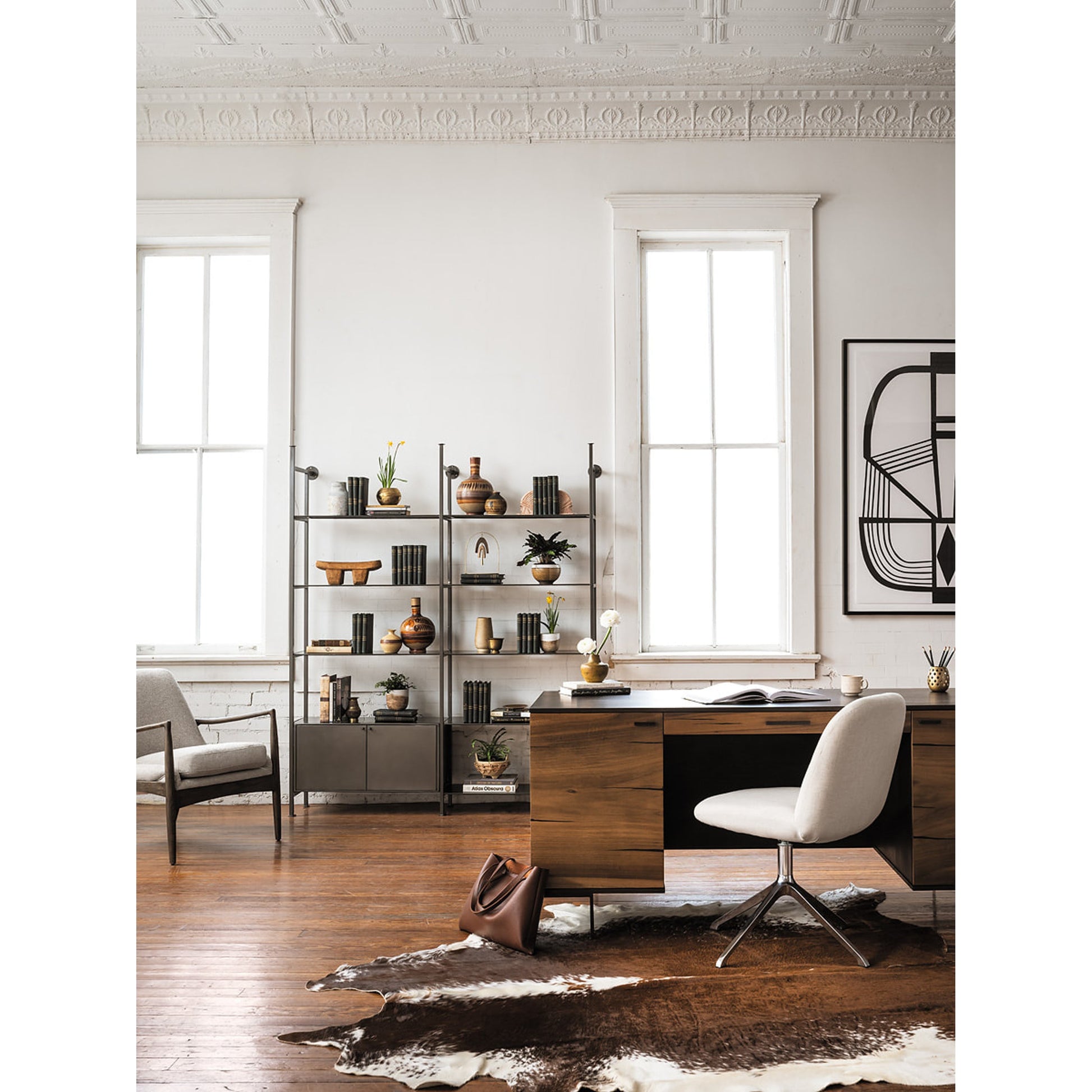 Braden Chair by Four Hands. Made from top grain leather, solid oak, 100% polyester in a modern style.