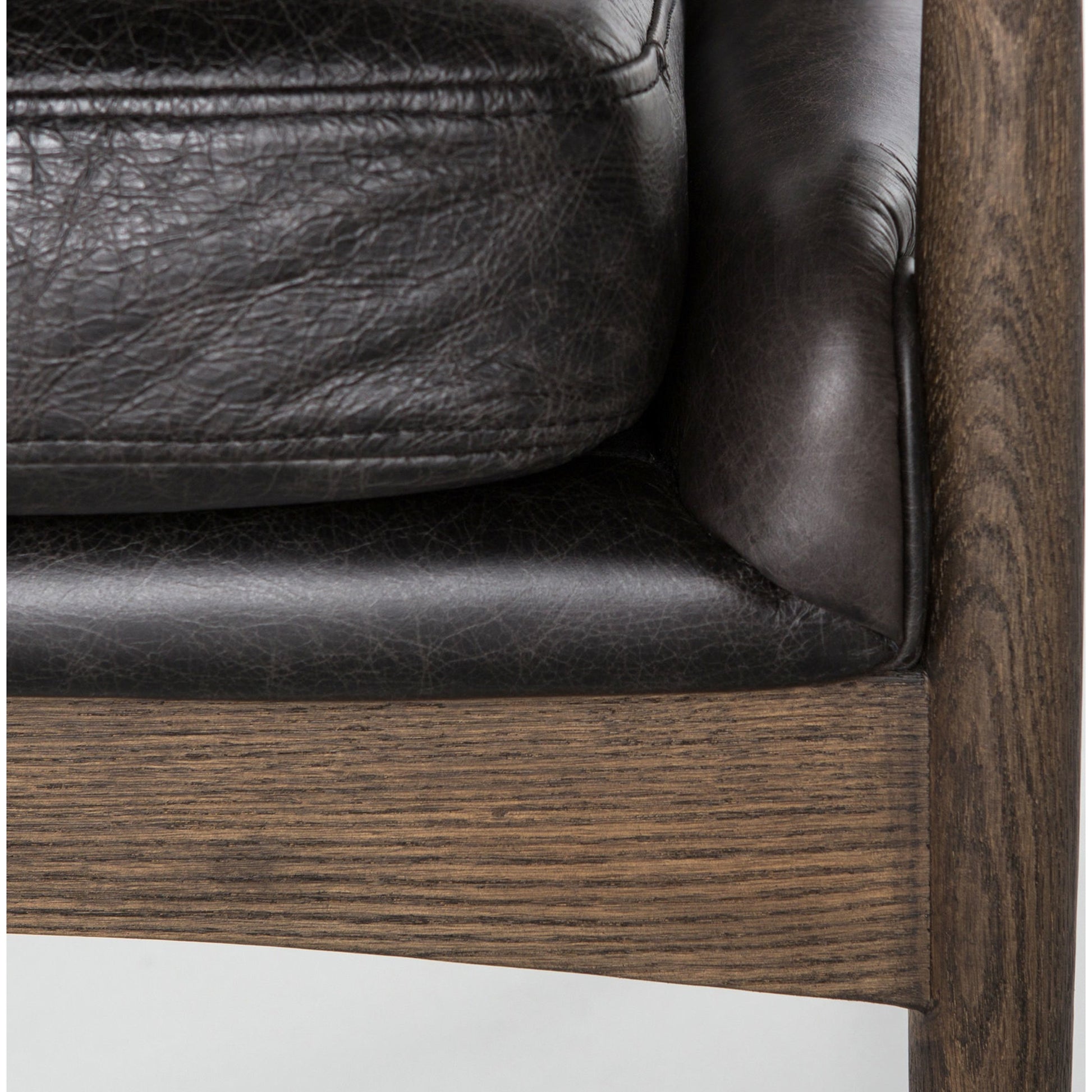 Braden Chair by Four Hands. Made from top grain leather, solid oak, 100% polyester in a modern style.