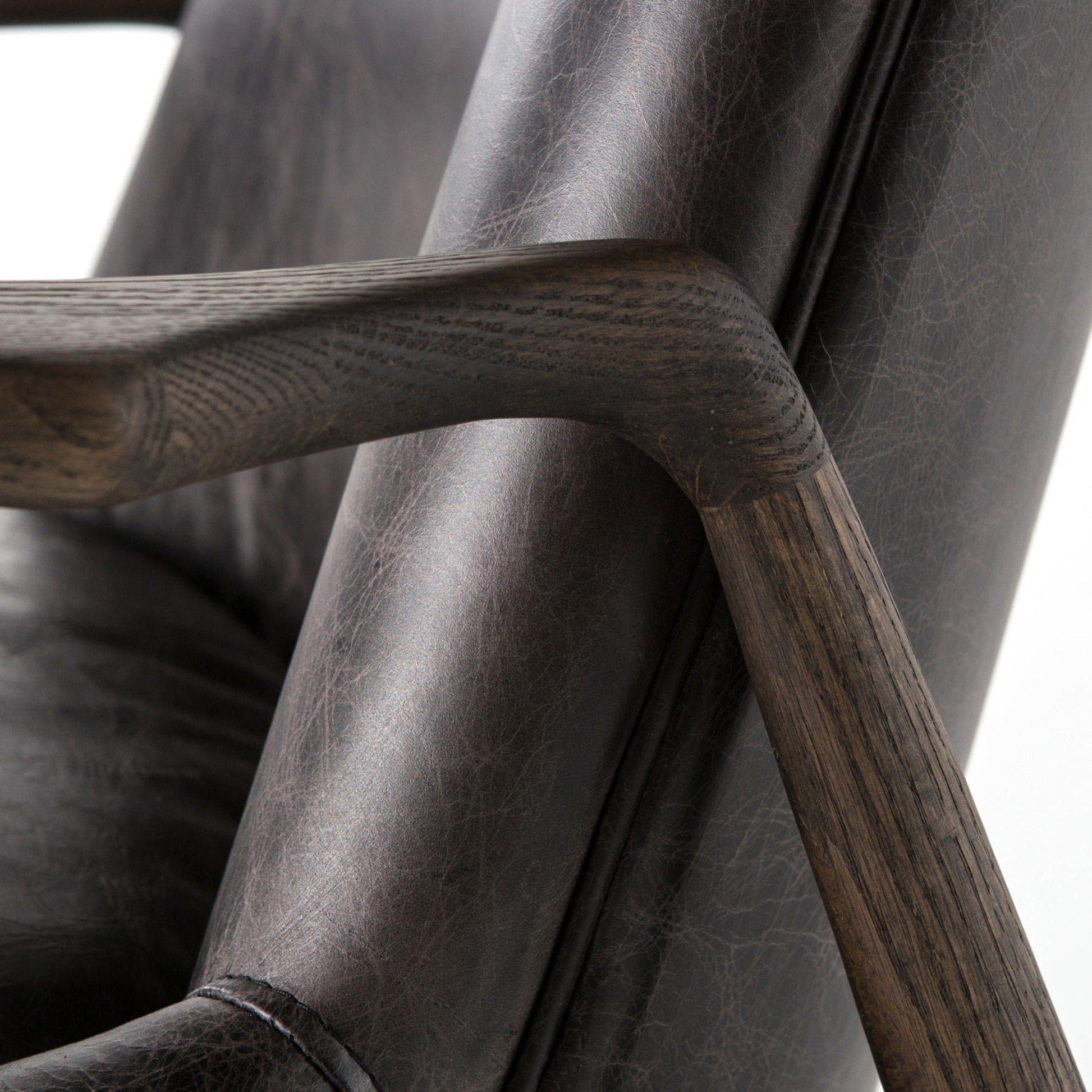 Braden Chair by Four Hands. Made from top grain leather, solid oak, 100% polyester in a modern style.