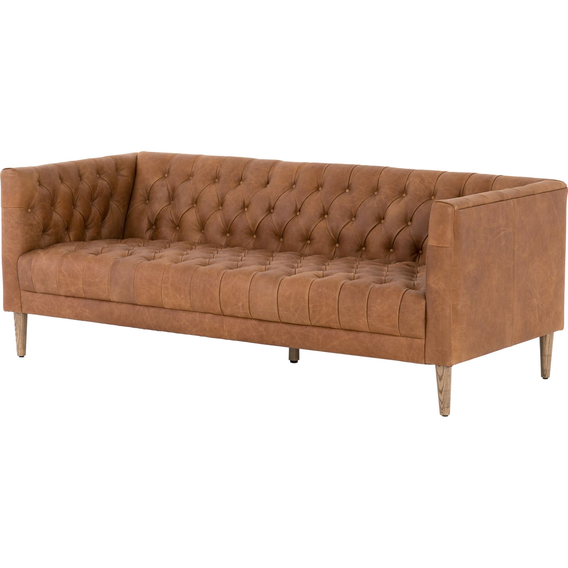 Williams Leather Sofa by Four Hands. Made from top grain leather, solid ash, 100% polyester in a rustic style.
