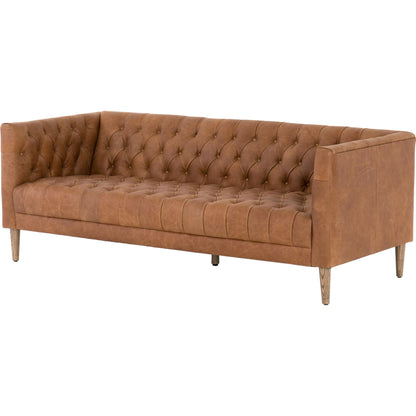 Williams Leather Sofa by Four Hands. Made from top grain leather, solid ash, 100% polyester in a rustic style.