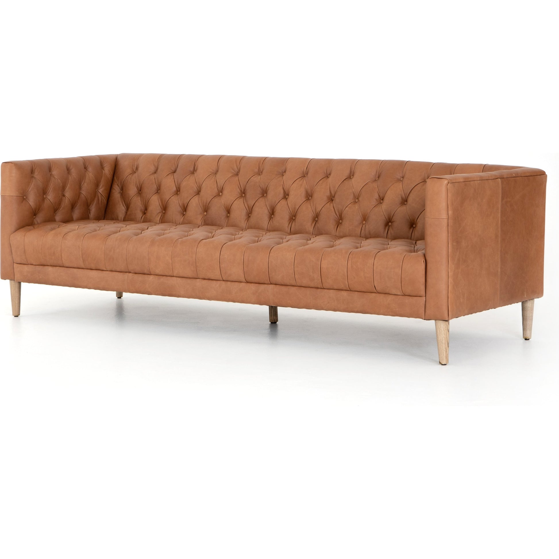 Williams Leather Sofa by Four Hands. Made from top grain leather, solid ash, 100% polyester in a rustic style.