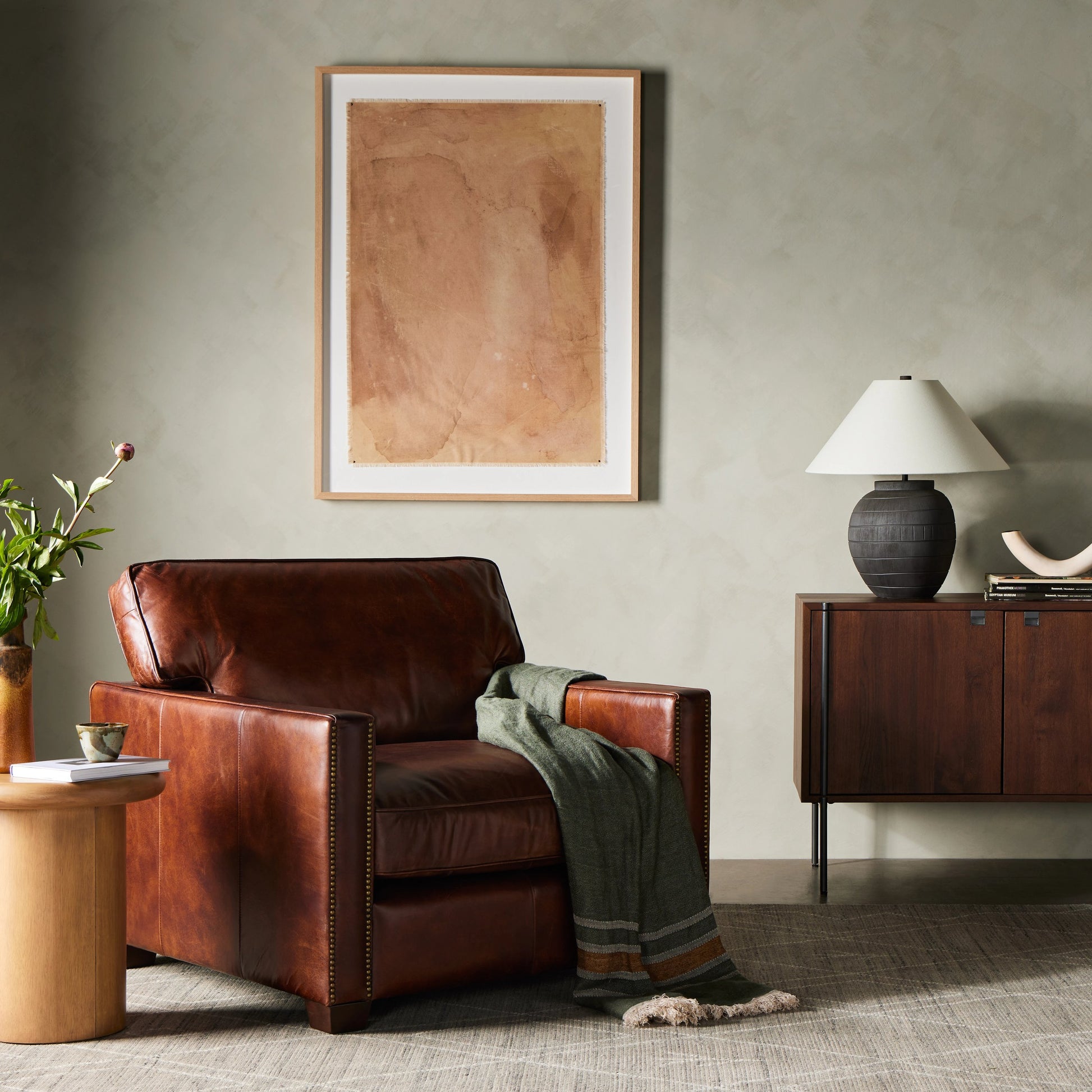 Larkin Club Chair by Four Hands in cigar and antique oak, antique brass nailhead. Made from top grain leather, solid ash, iron in a modern style.