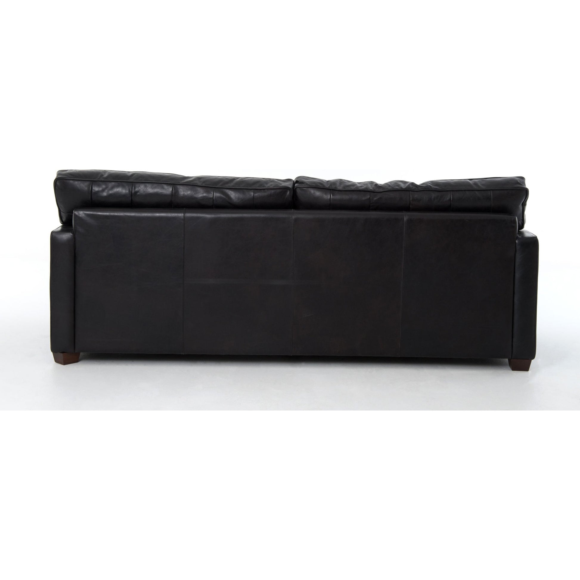 Larkin Sofa by Four Hands in cigar, antique oak, antique brass nailhead. Made from top grain leather, solid ash, iron in a modern style.