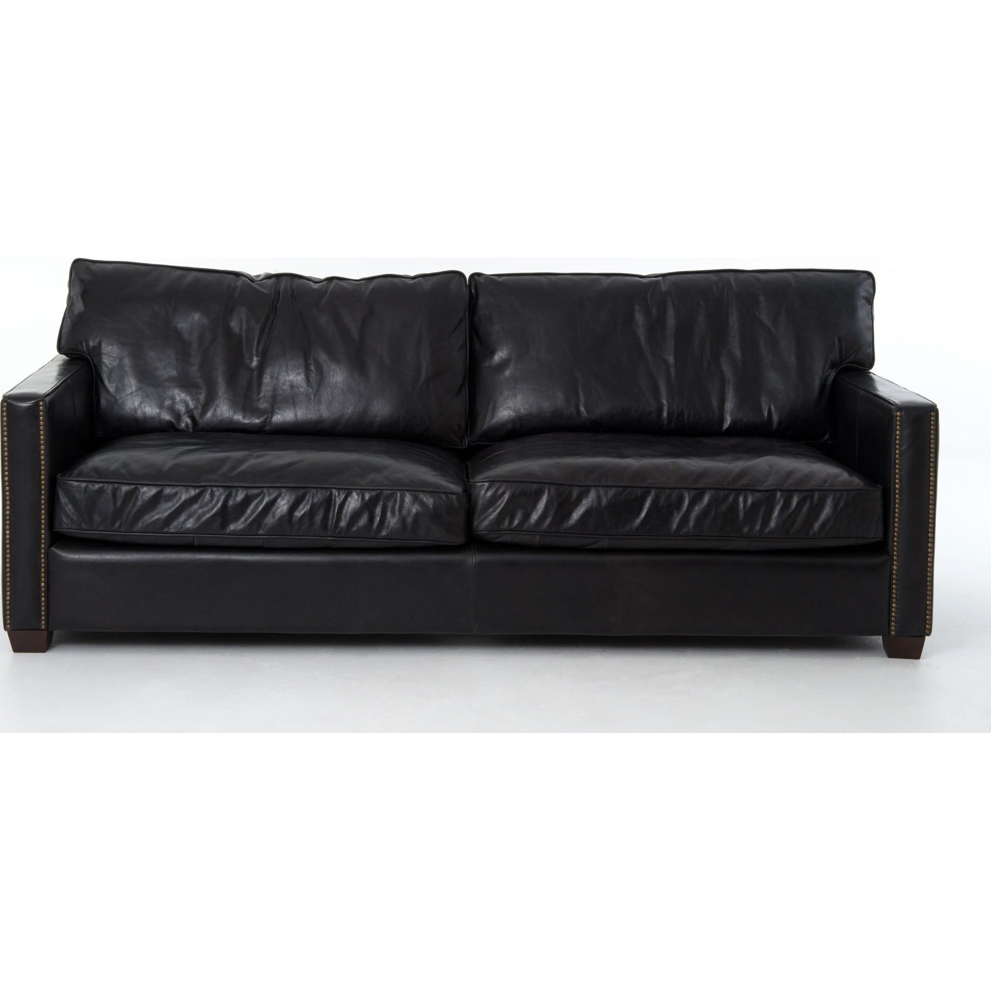 Larkin Sofa by Four Hands in cigar, antique oak, antique brass nailhead. Made from top grain leather, solid ash, iron in a modern style.