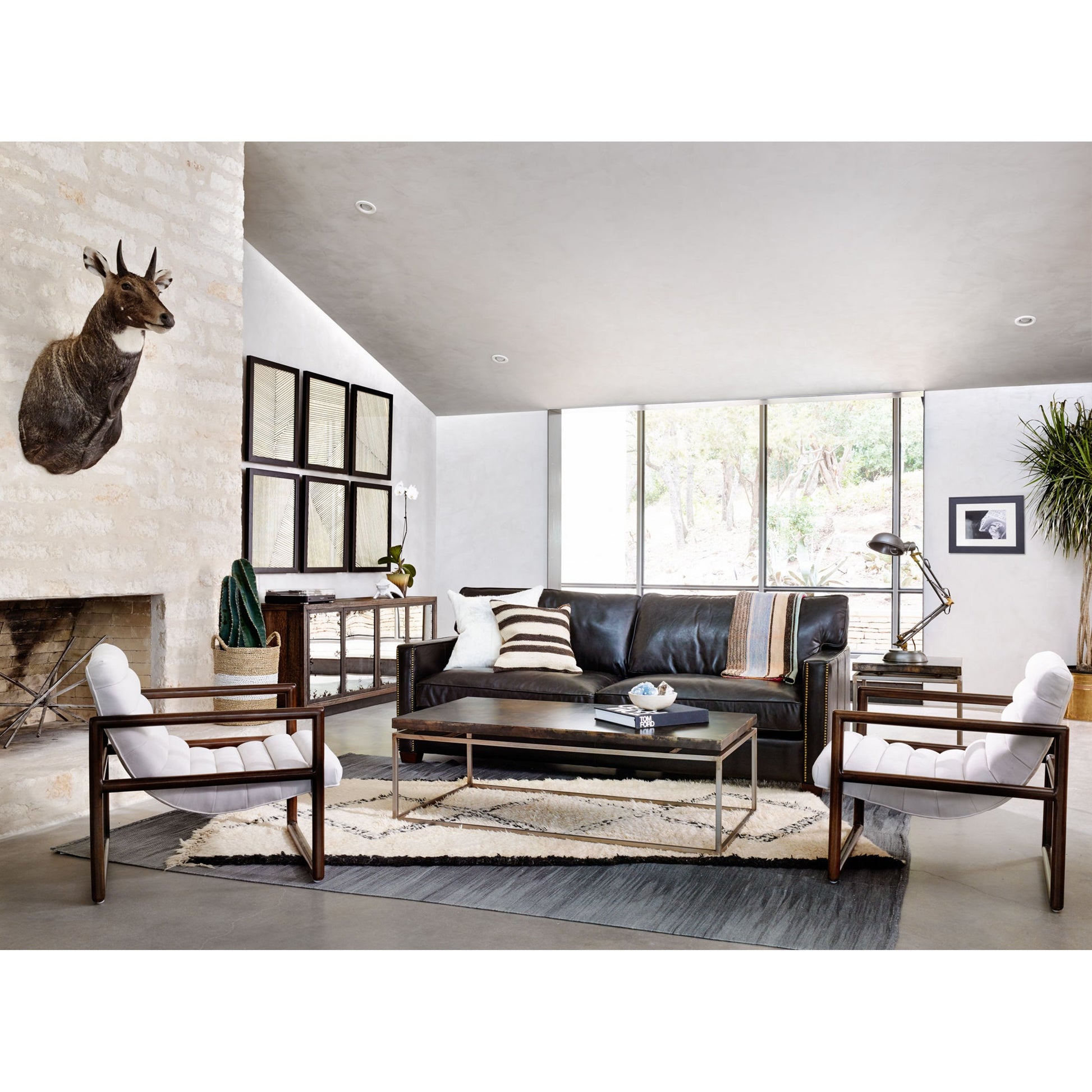 Larkin Sofa by Four Hands in cigar, antique oak, antique brass nailhead. Made from top grain leather, solid ash, iron in a modern style.