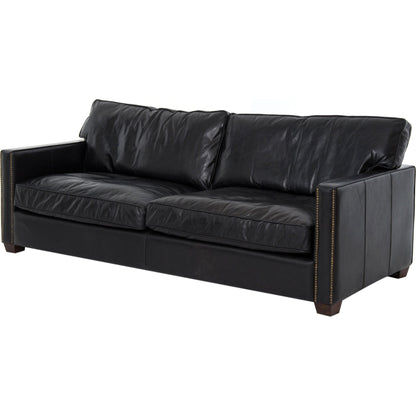 Larkin Sofa by Four Hands in cigar, antique oak, antique brass nailhead. Made from top grain leather, solid ash, iron in a modern style.