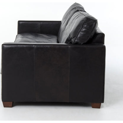 Larkin Sofa by Four Hands in cigar, antique oak, antique brass nailhead. Made from top grain leather, solid ash, iron in a modern style.