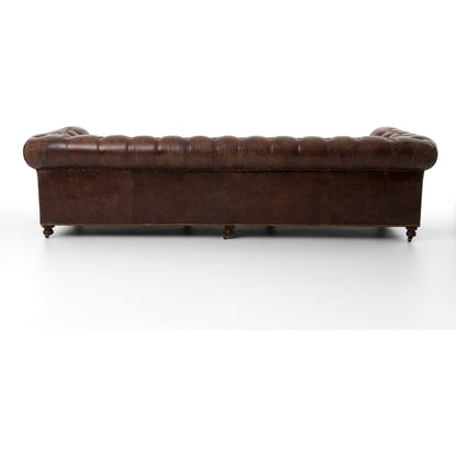 Conrad Sofa by Four Hands in cigar, antique oak, antique brass nailhead. Made from top grain leather, solid ash, iron in a traditional style.