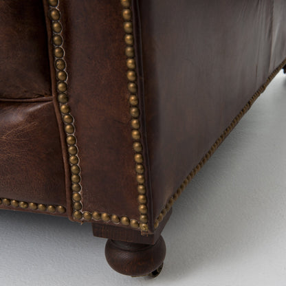 Conrad Sofa by Four Hands in cigar, antique oak, antique brass nailhead. Made from top grain leather, solid ash, iron in a traditional style.