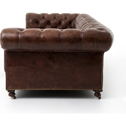 Conrad Sofa by Four Hands in cigar, antique oak, antique brass nailhead. Made from top grain leather, solid ash, iron in a traditional style.