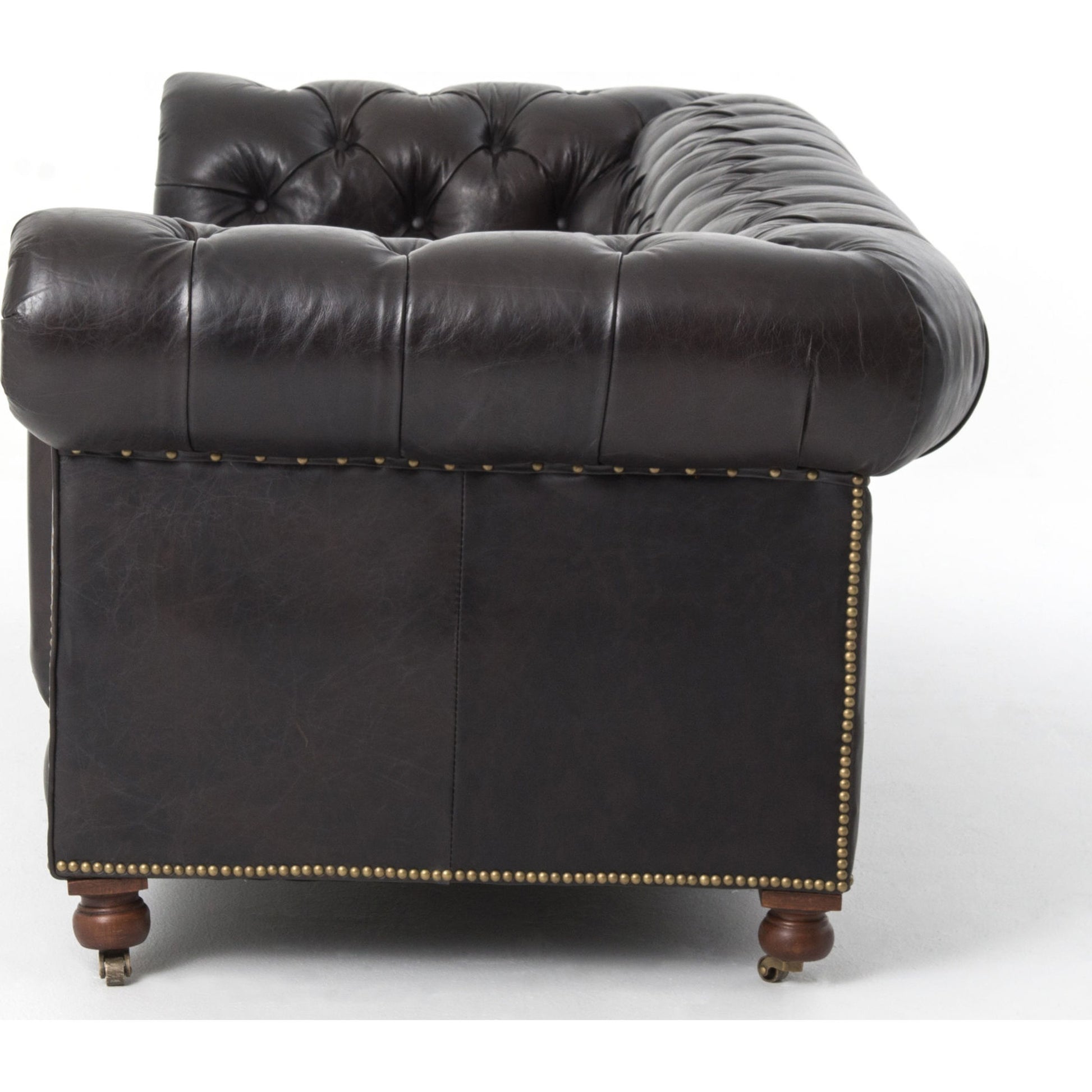Conrad Sofa by Four Hands in cigar, antique oak, antique brass nailhead. Made from top grain leather, solid ash, iron in a traditional style.