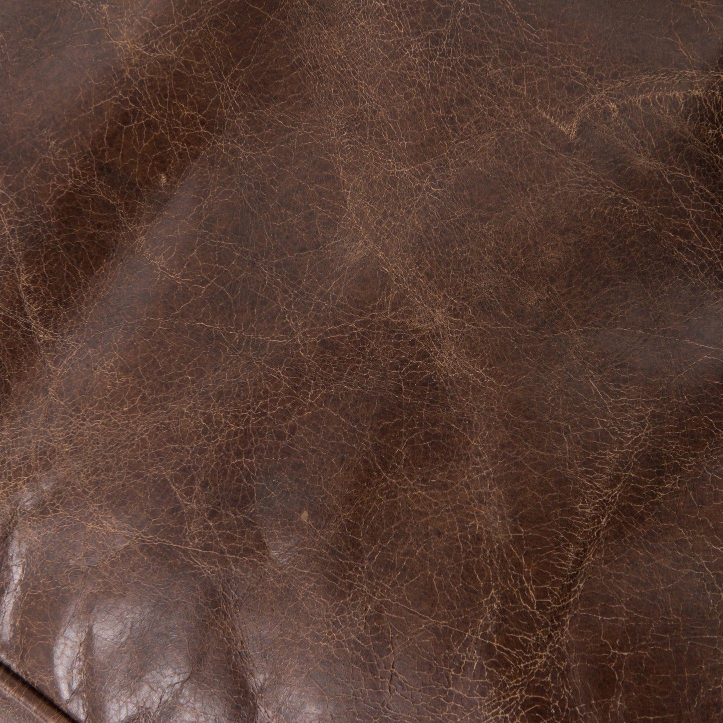 006 SR-368945 | Closeup | Conrad Sofa by Four Hands in cigar, antique oak, antique brass nailhead. Made from top grain leather, solid ash, iron in a traditional style.