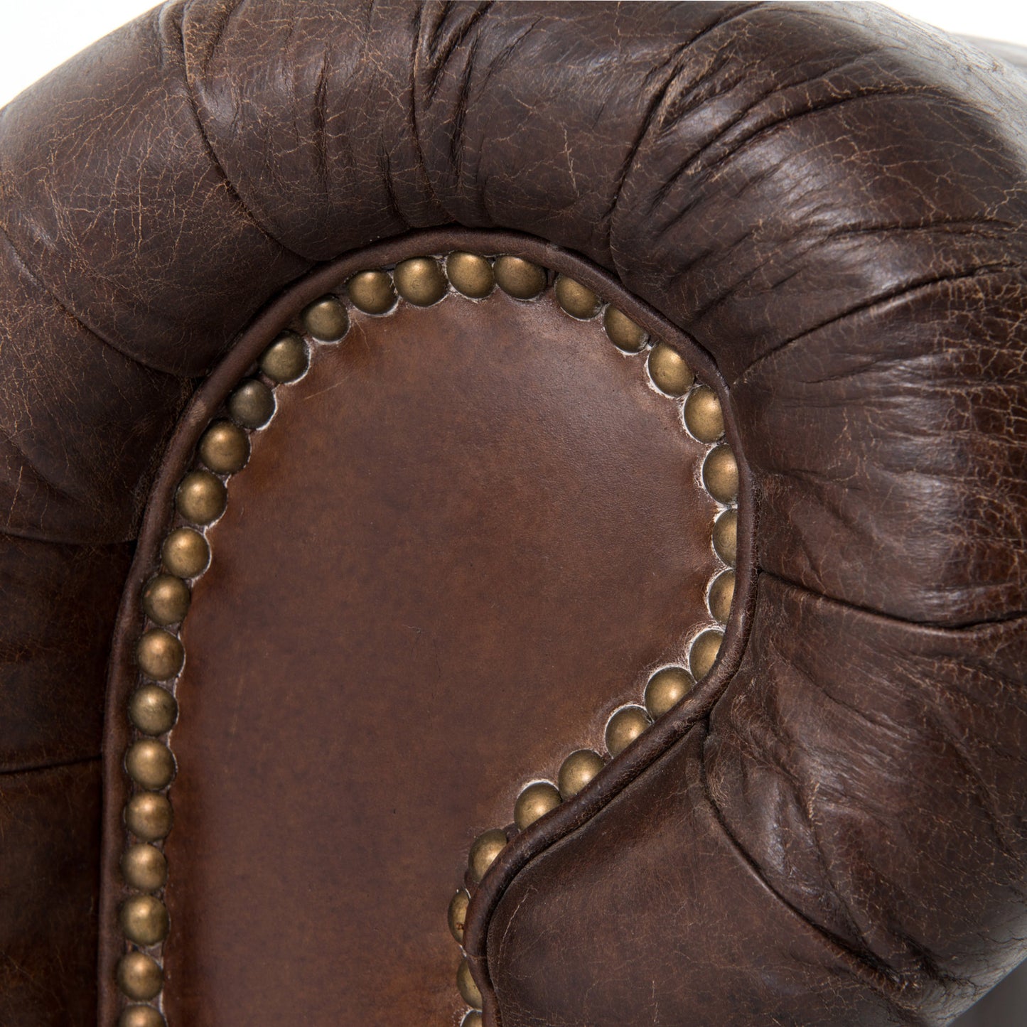 007 SR-368945 | Closeup | Conrad Sofa by Four Hands in cigar, antique oak, antique brass nailhead. Made from top grain leather, solid ash, iron in a traditional style.