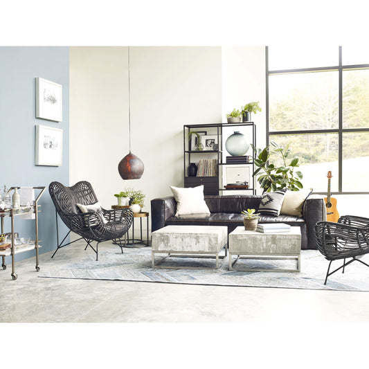Nolita Reverse Stitch Sofa by Four Hands in rider black. Made from top grain leather, solid ash, 100% polyester in a modern style.