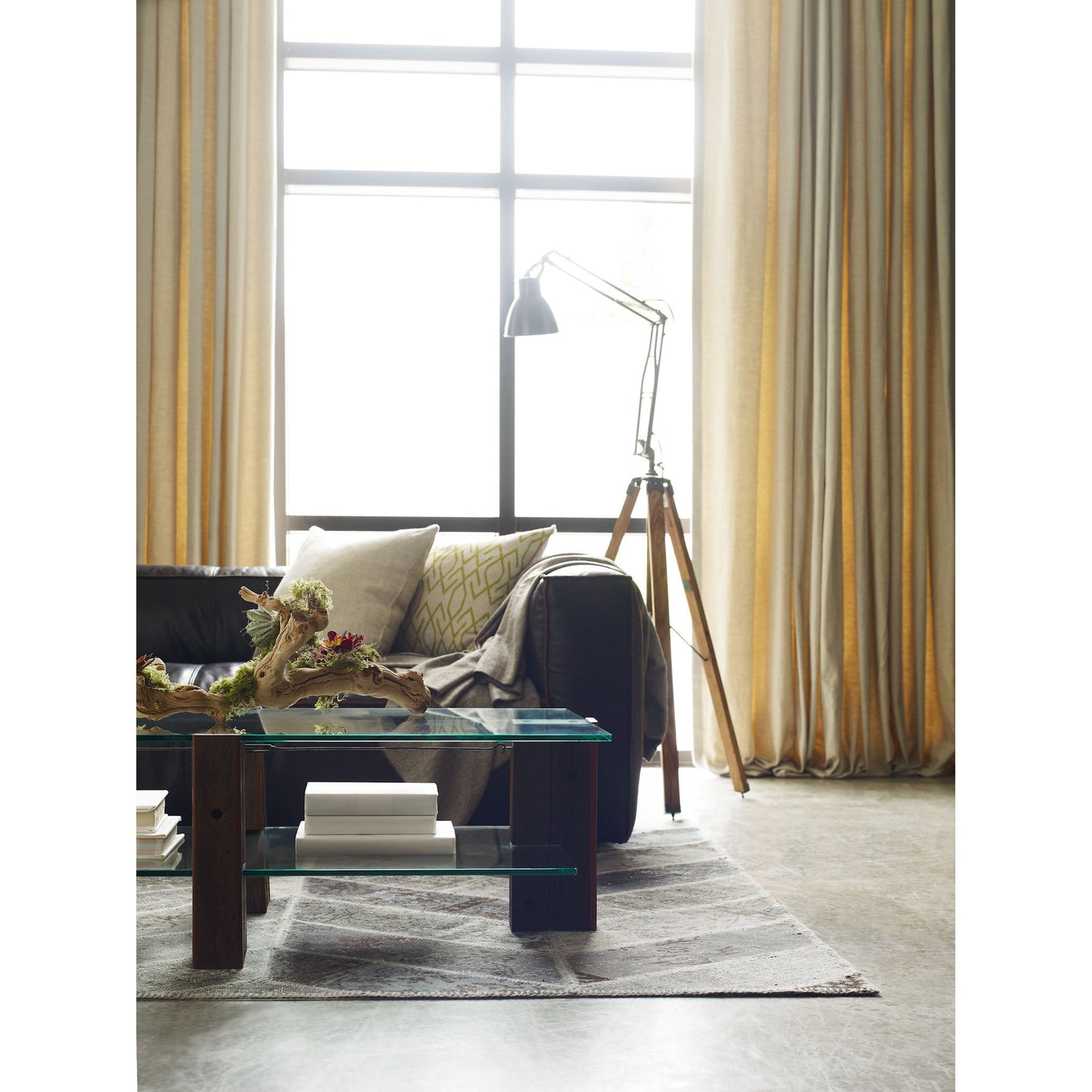 008 S-279451 | Lifestyle | Nolita Reverse Stitch Sofa by Four Hands in rider black. Made from top grain leather, solid ash, 100% polyester in a modern style.