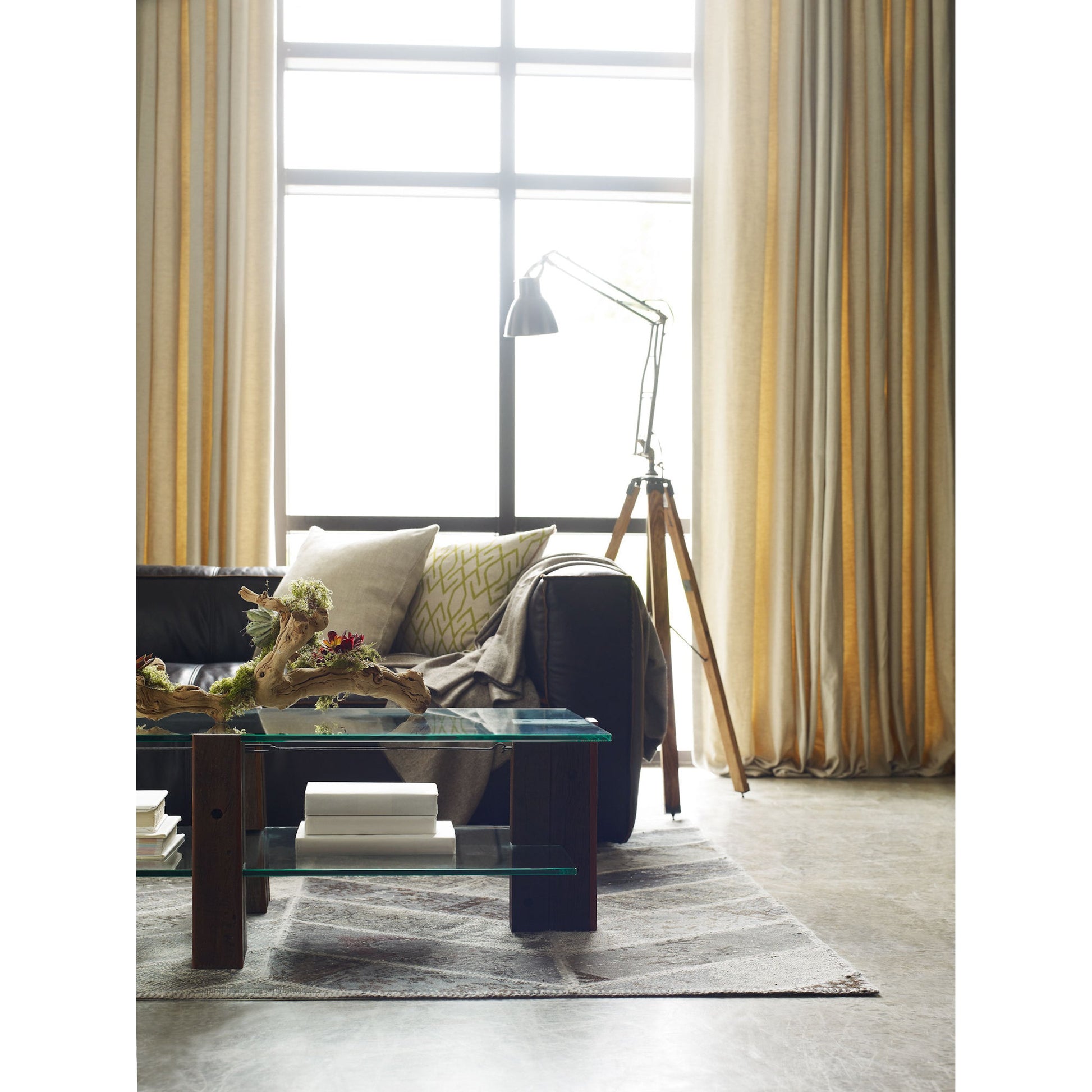 Nolita Reverse Stitch Sofa by Four Hands in rider black. Made from top grain leather, solid ash, 100% polyester in a modern style.