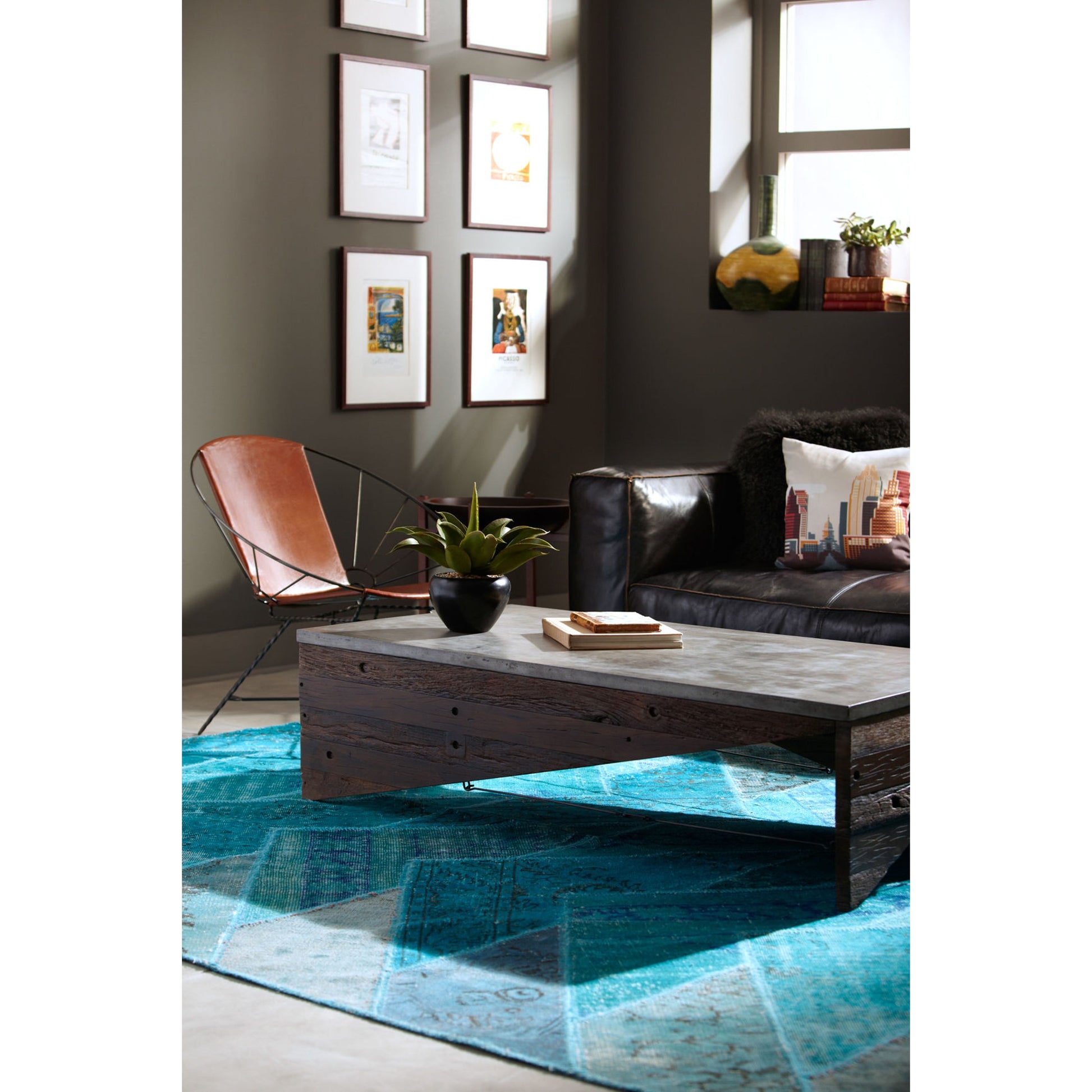 Nolita Reverse Stitch Sofa by Four Hands in rider black. Made from top grain leather, solid ash, 100% polyester in a modern style.