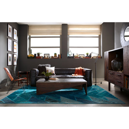 Nolita Reverse Stitch Sofa by Four Hands in rider black. Made from top grain leather, solid ash, 100% polyester in a modern style.