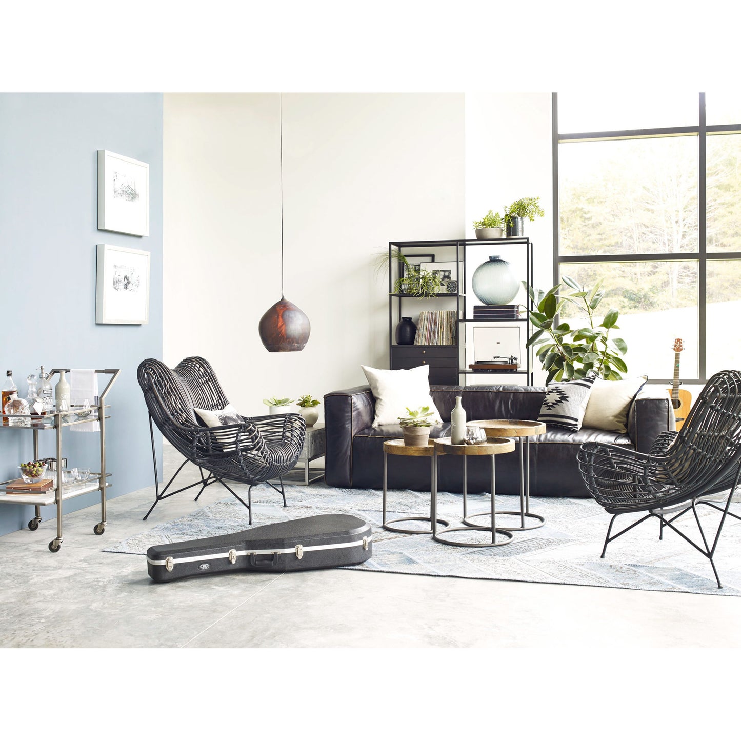 014 S-279451 | Lifestyle | Nolita Reverse Stitch Sofa by Four Hands in rider black. Made from top grain leather, solid ash, 100% polyester in a modern style.