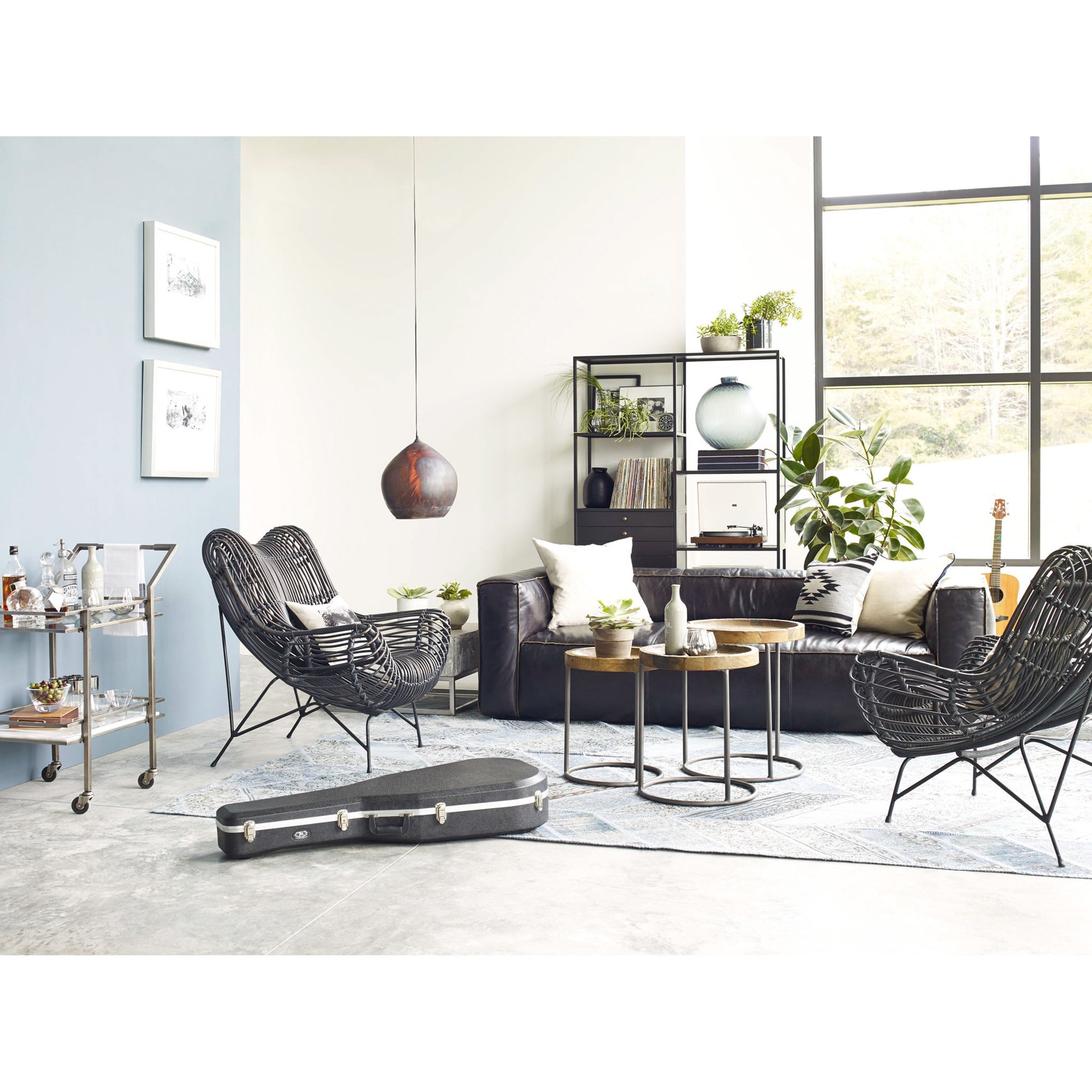 Nolita Reverse Stitch Sofa by Four Hands in rider black. Made from top grain leather, solid ash, 100% polyester in a modern style.