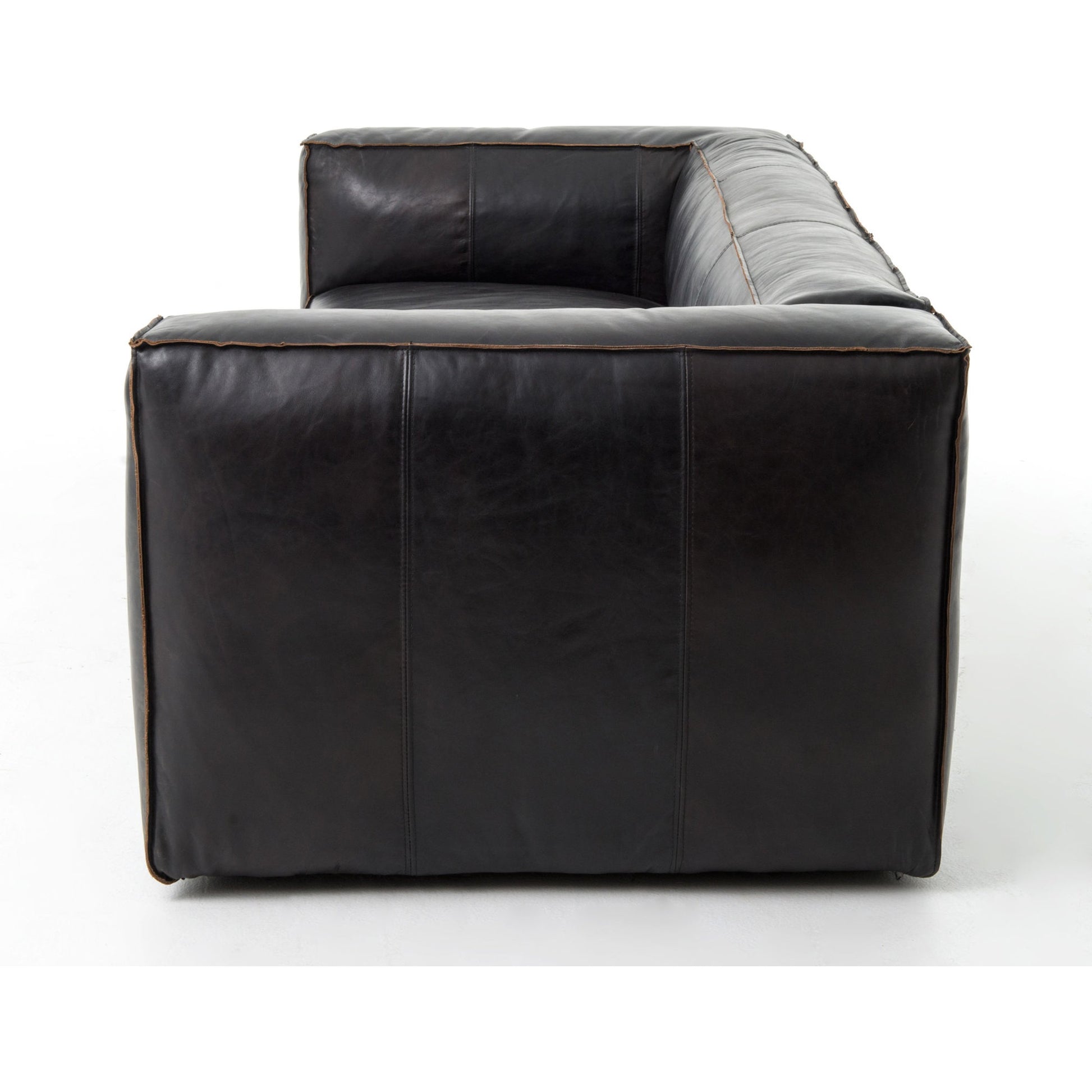 Nolita Reverse Stitch Sofa by Four Hands in rider black. Made from top grain leather, solid ash, 100% polyester in a modern style.