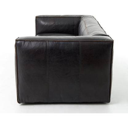 Nolita Reverse Stitch Sofa by Four Hands in rider black. Made from top grain leather, solid ash, 100% polyester in a modern style.