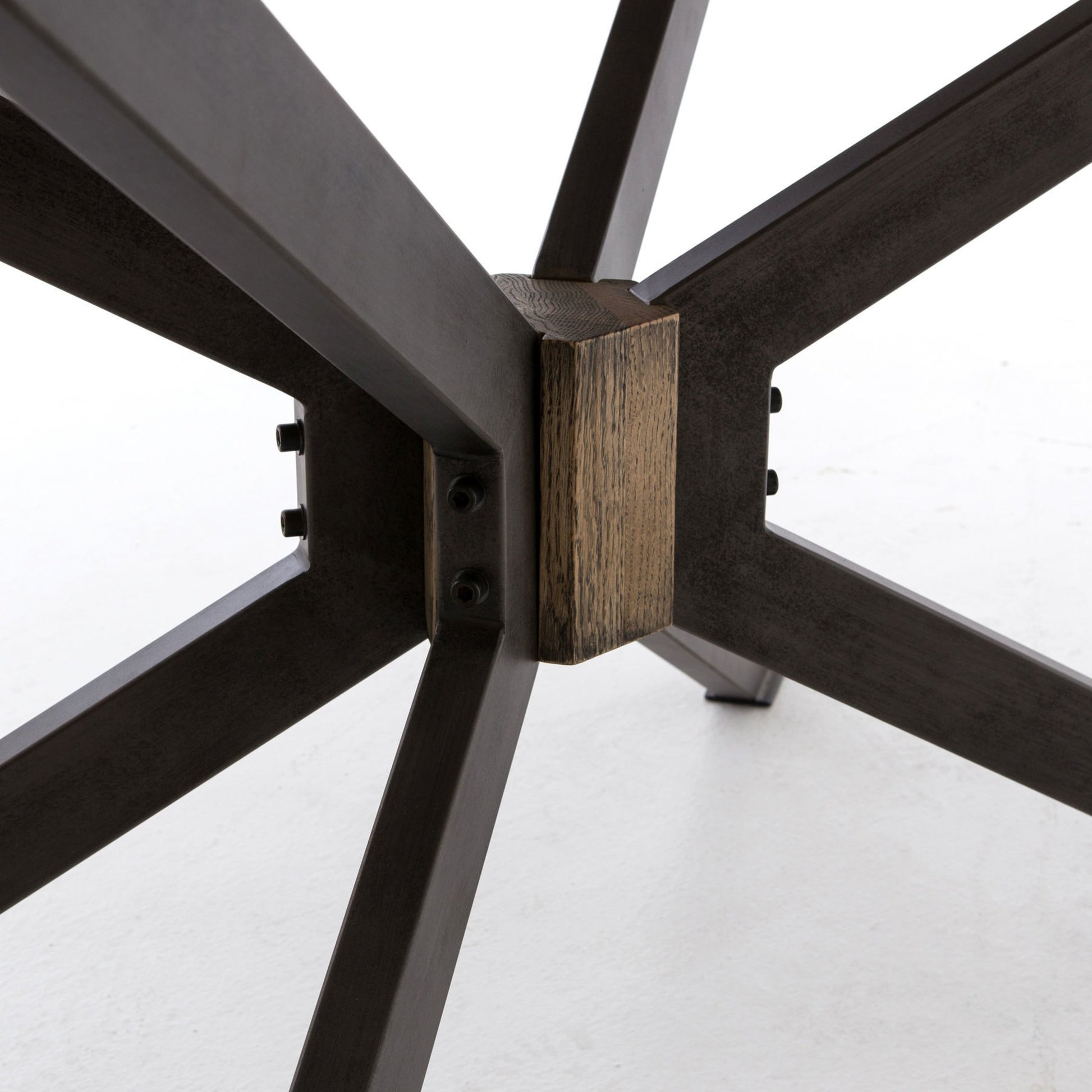 Spider Dining Table by Four Hands in light rustic black, bright brass clad, sandy oak. Made from brass, iron, solid oak in a cottage & farmhouse style.
