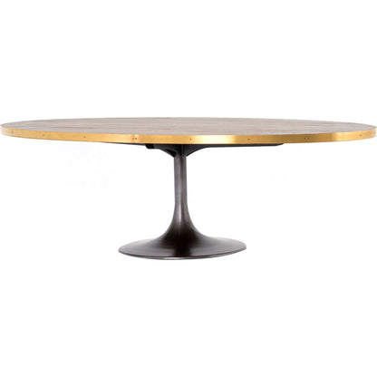 Evans Oval Dining Table by Four Hands in reclaimed burnt oak, vessel grey, polished brass. Made from solid reclaimed oak, iron, stainless steel in a modern style.