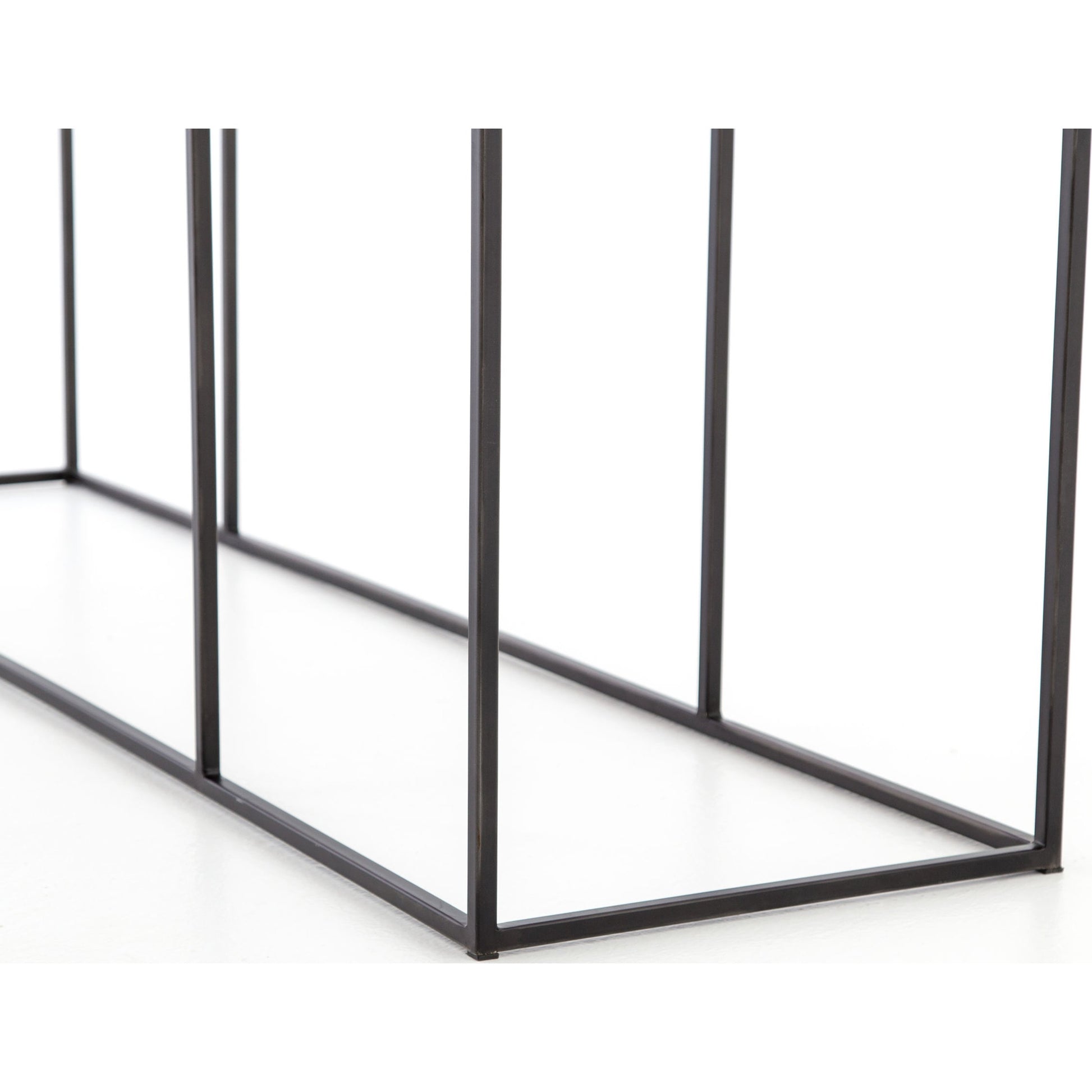 Phillip Console Table by Four Hands in bright brass clad, dark antique bronze and dark antique bronze, bright brass clad. Made from brass, iron, poplar plywood in a modern style.