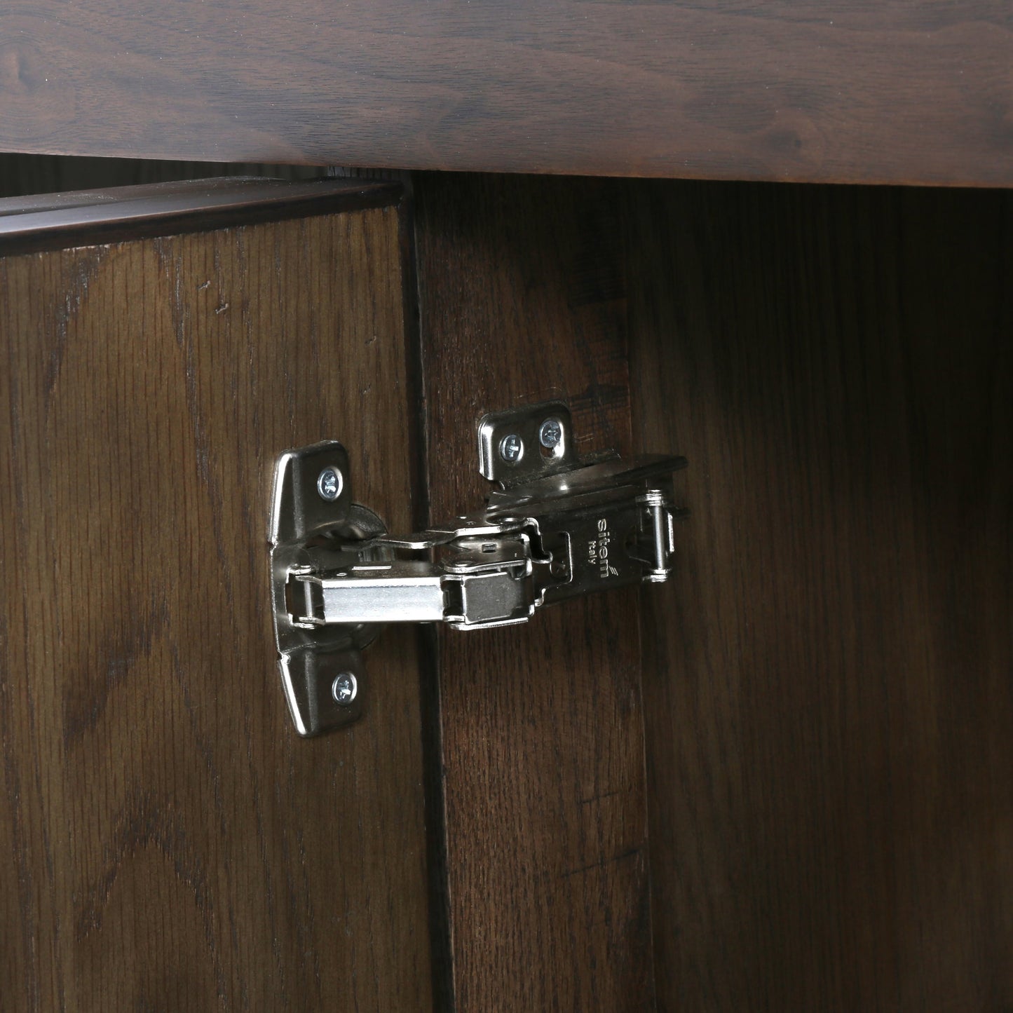 008 S-338897 | Closeup | Enzo Sideboard by Four Hands in dark walnut. Made from walnut veneer, brass, stainless steel in a modern style.