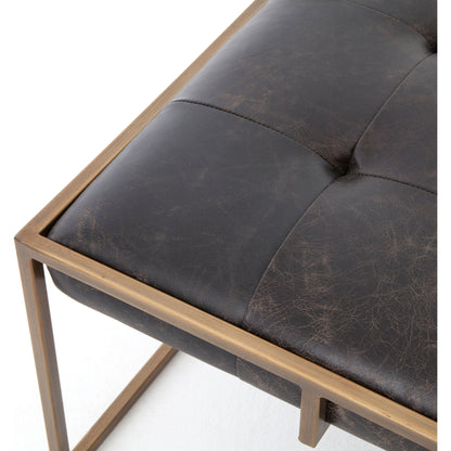 Oxford Square Coffee Table by Four Hands in rialto ebony, antique brass. Made from top grain leather, iron, 100% polyester in a modern style.