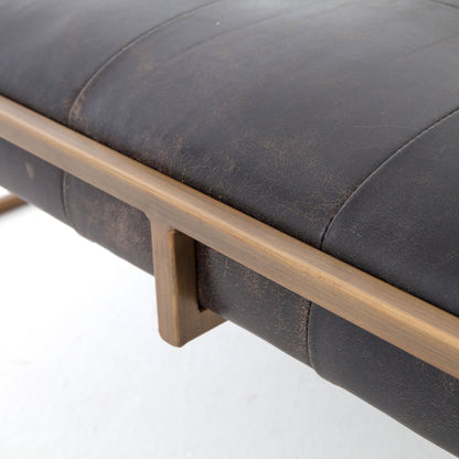 Oxford Square Coffee Table by Four Hands in rialto ebony, antique brass. Made from top grain leather, iron, 100% polyester in a modern style.