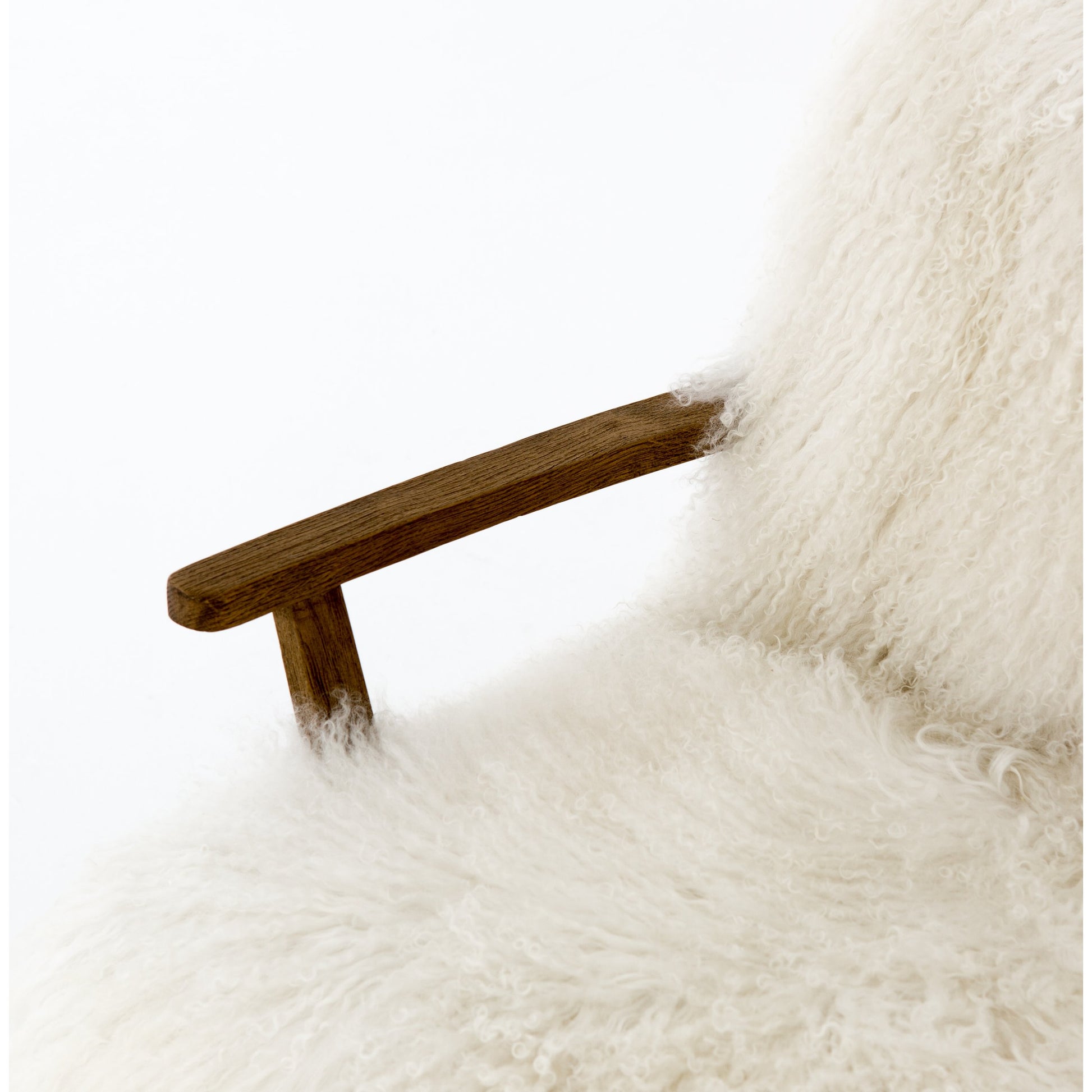 Ashland Armchair by Four Hands in mongolia cream fur, drifted oak. Made from mongolia fur, solid oak, 100% polyester in a modern style.