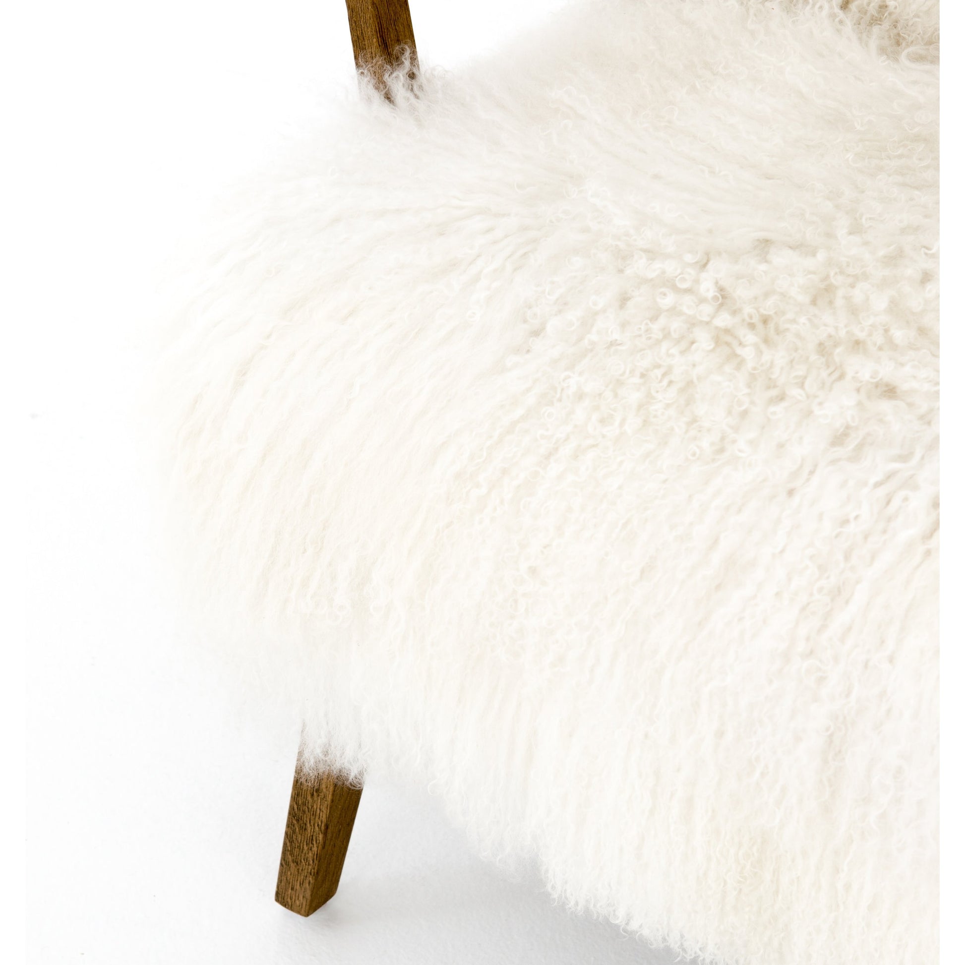 Ashland Armchair by Four Hands in mongolia cream fur, drifted oak. Made from mongolia fur, solid oak, 100% polyester in a modern style.