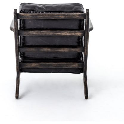 Brooks Lounge Chair by Four Hands in rialto ebony, black wash. Made from top grain leather, solid oak, 67% cotton, 33% flax, linen in a modern style.