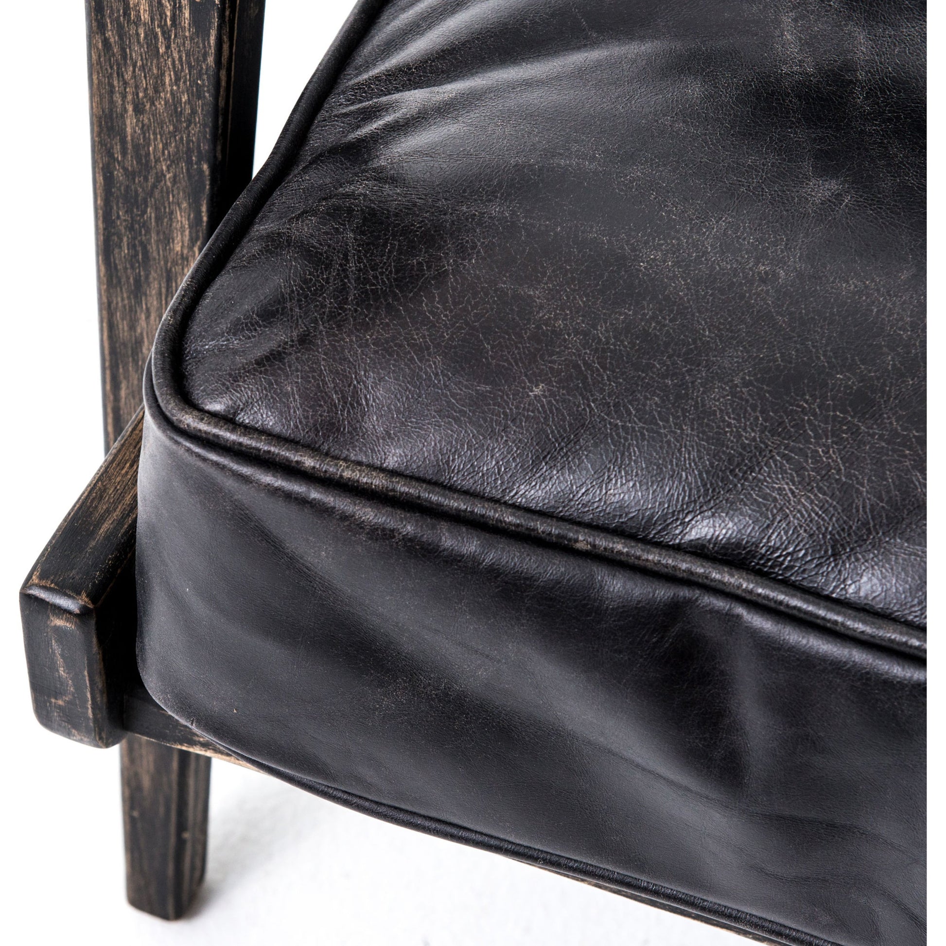 Brooks Lounge Chair by Four Hands in rialto ebony, black wash. Made from top grain leather, solid oak, 67% cotton, 33% flax, linen in a modern style.