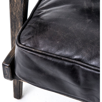 Brooks Lounge Chair by Four Hands in rialto ebony, black wash. Made from top grain leather, solid oak, 67% cotton, 33% flax, linen in a modern style.
