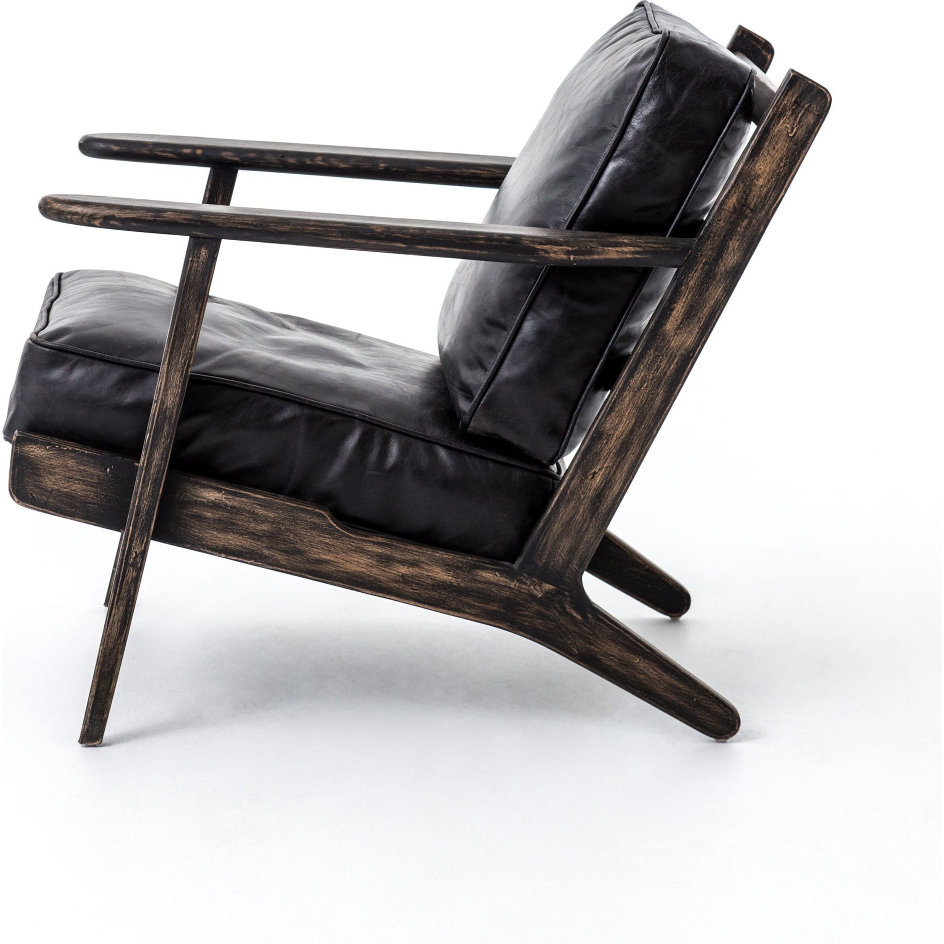 Brooks Lounge Chair by Four Hands in rialto ebony, black wash. Made from top grain leather, solid oak, 67% cotton, 33% flax, linen in a modern style.