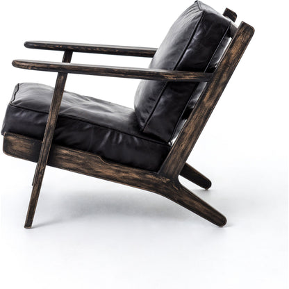 Brooks Lounge Chair by Four Hands in rialto ebony, black wash. Made from top grain leather, solid oak, 67% cotton, 33% flax, linen in a modern style.