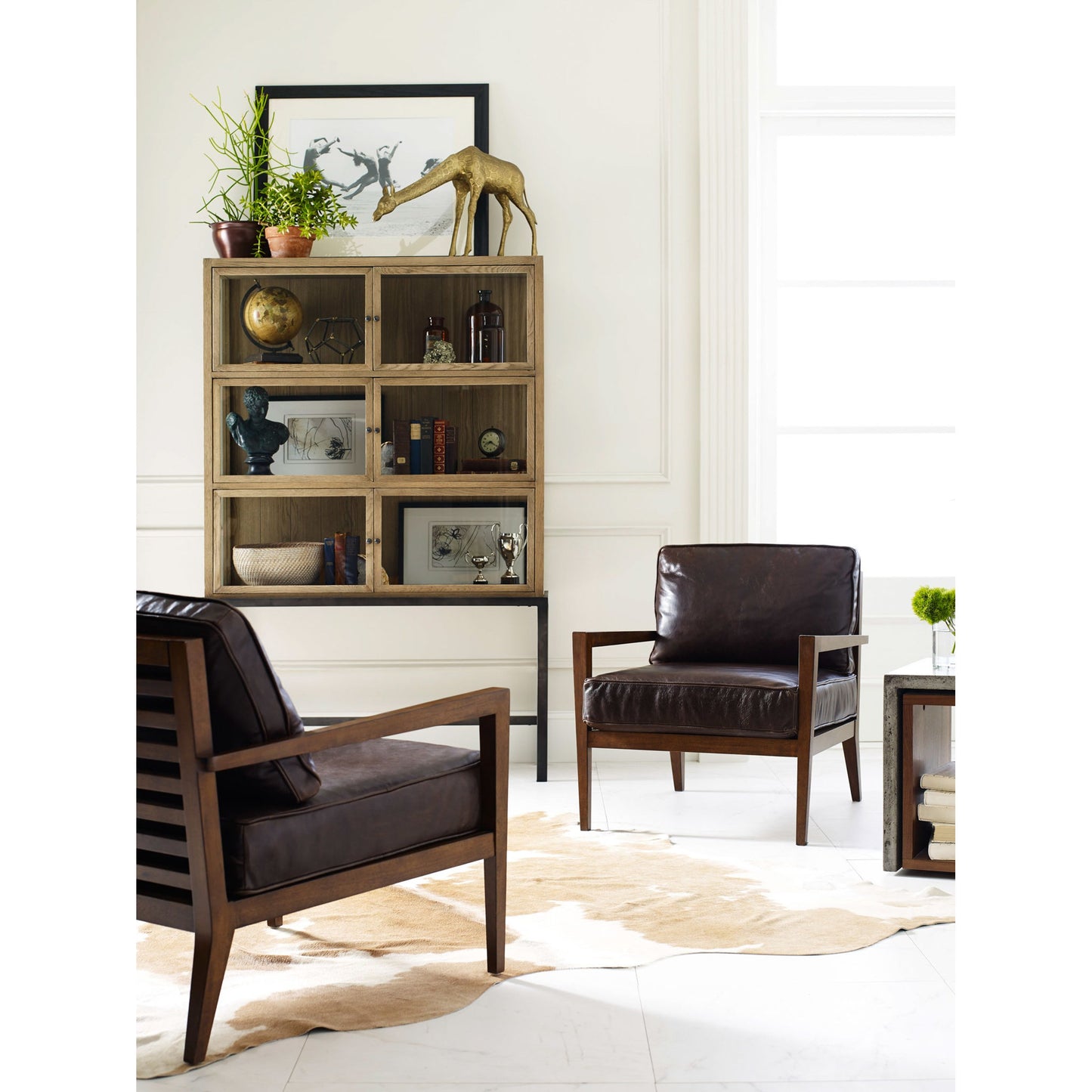 012 S-279523 | Lifestyle | Spencer Curio Cabinet by Four Hands. Made from solid oak, iron, oak veneer in a modern style.