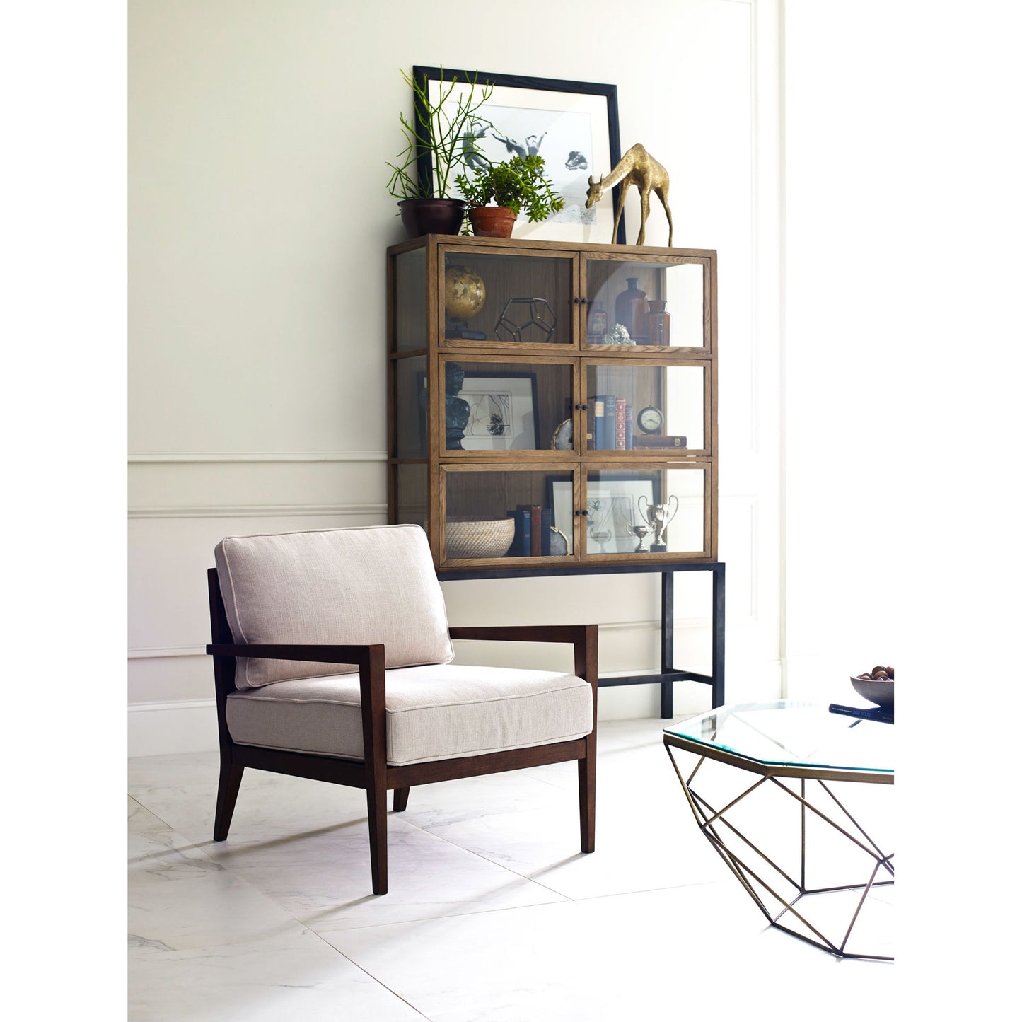014 S-279523 | Lifestyle | Spencer Curio Cabinet by Four Hands. Made from solid oak, iron, oak veneer in a modern style.