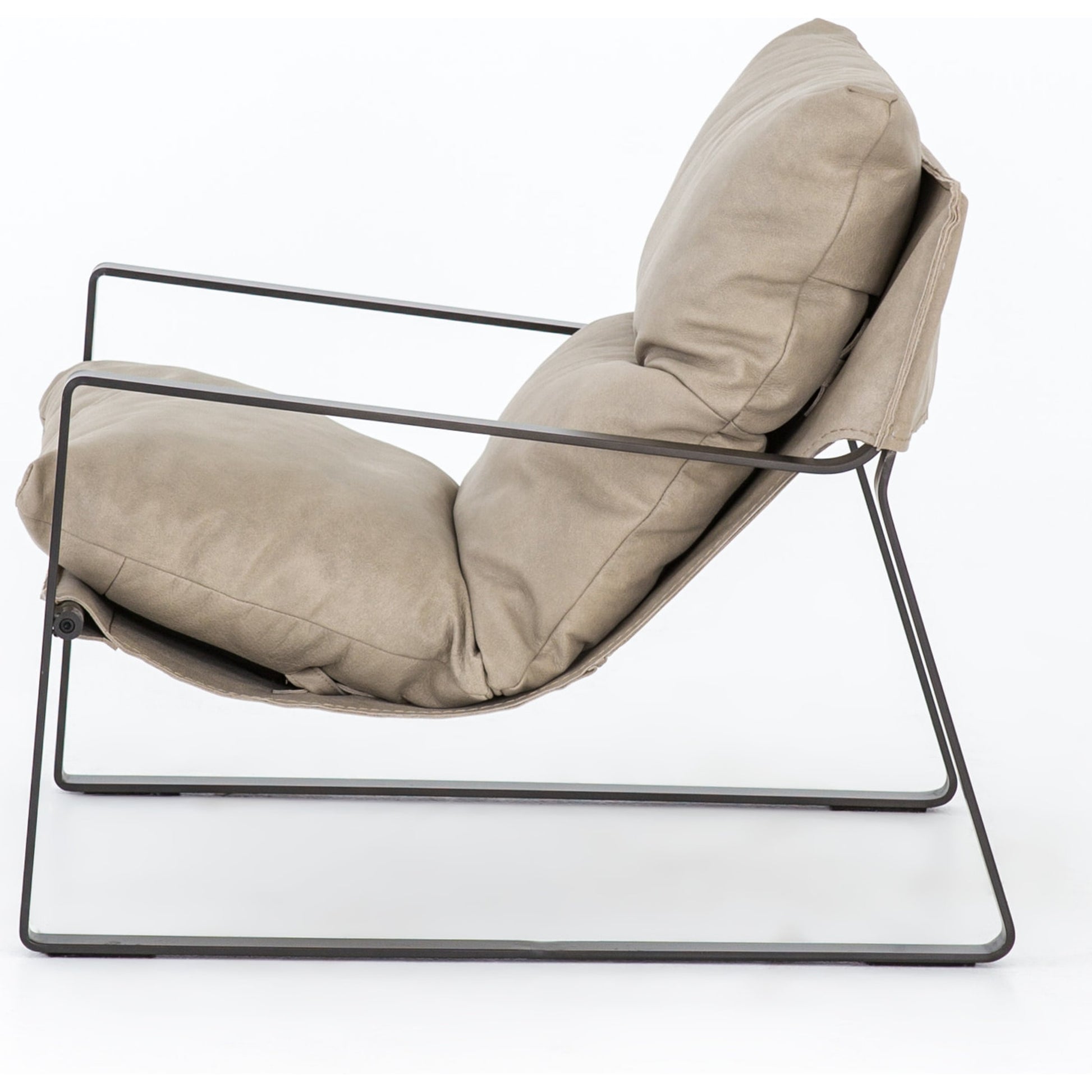 Emmett Sling Chair by Four Hands. Made from top grain leather, iron, 100% polyester in a modern style.