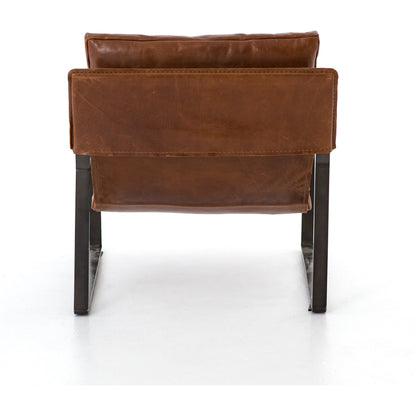 Emmett Sling Chair by Four Hands. Made from top grain leather, iron, 100% polyester in a modern style.