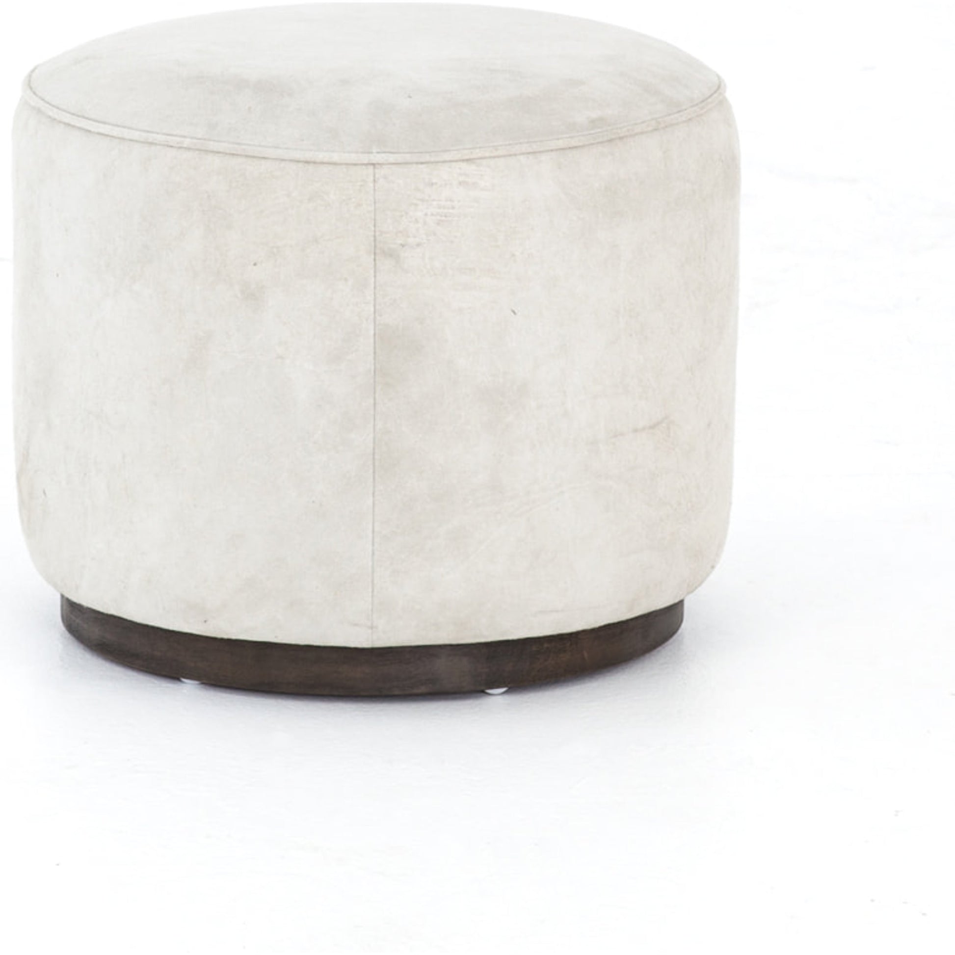 Sinclair Round Ottoman by Four Hands. Made from unique in a modern style.