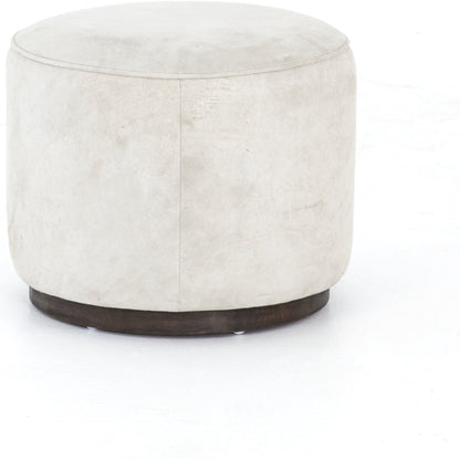 Sinclair Round Ottoman by Four Hands. Made from unique in a modern style.