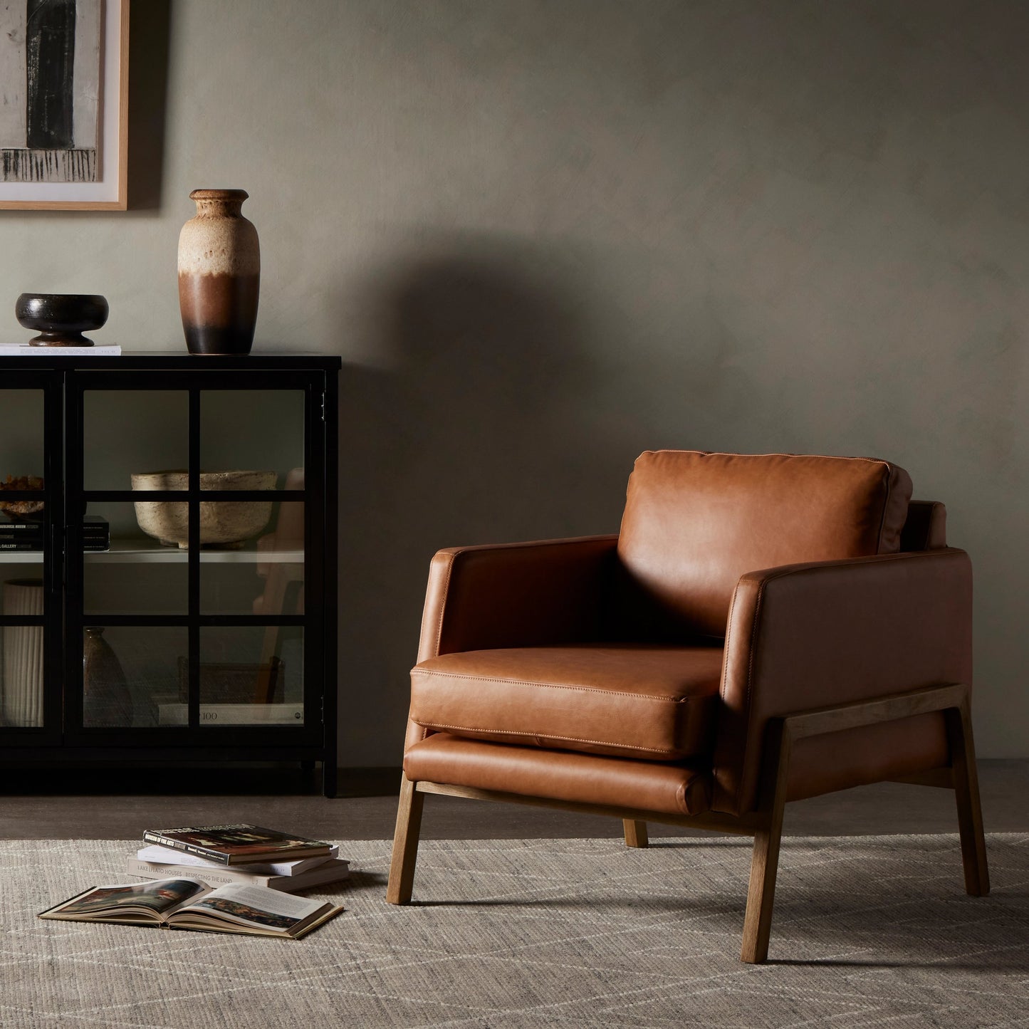 023 SR-809860 | Lifestyle | Diana Chair by Four Hands in sonoma butterscotch. Made from top grain leather, solid parawood, 100% polyester in a modern style.