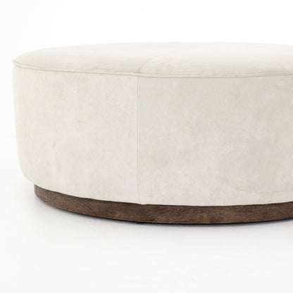 Sinclair Round Ottoman by Four Hands. Made from unique in a modern style.